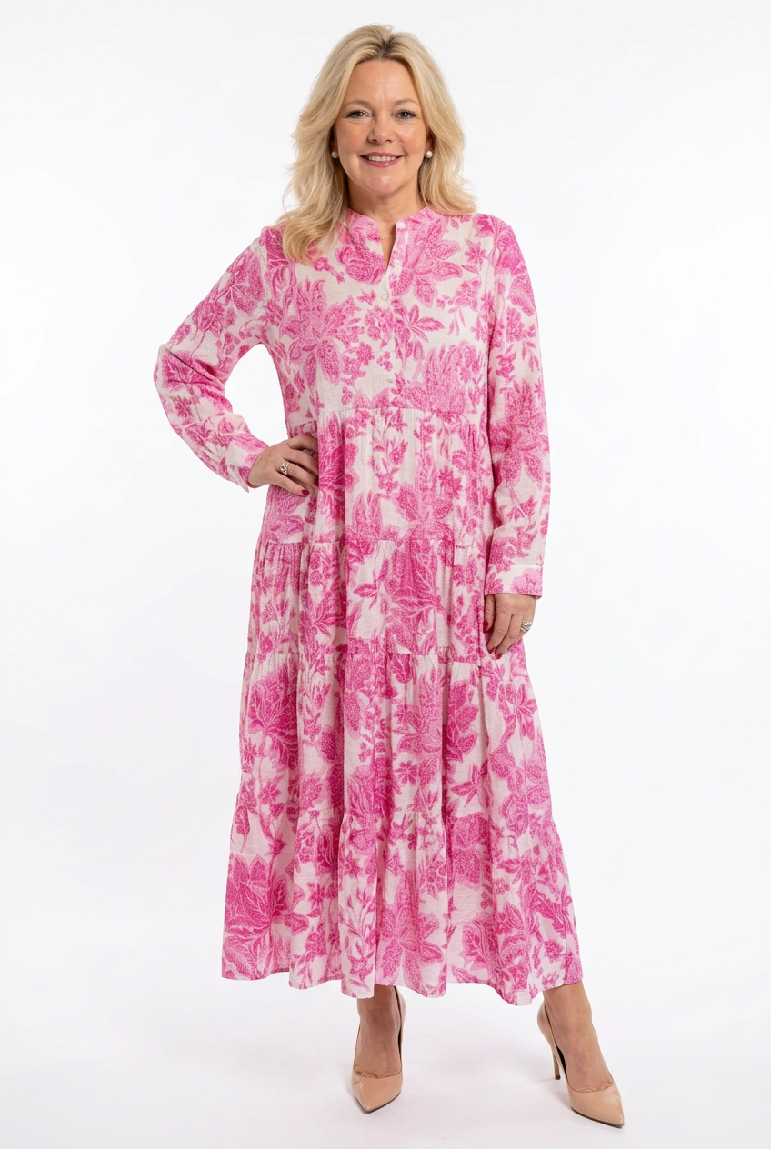 a-linjainen ja pitkähihainen maximekko valkoisella pohjalla fuksia kuosi.
